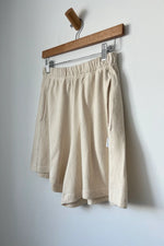 Load image into Gallery viewer, Flared basketball shorts (natural)
