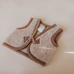 Load image into Gallery viewer, preorder wool bodywarmer (beige with brown trim)
