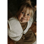 Load image into Gallery viewer, sprouting-littles-wool-bodywarmer
